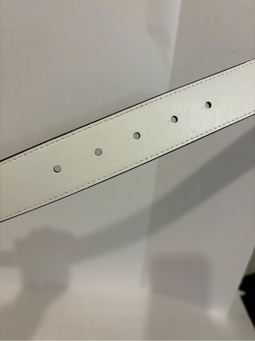 Nike Black Perforated Belt with Silver Oval Buckle